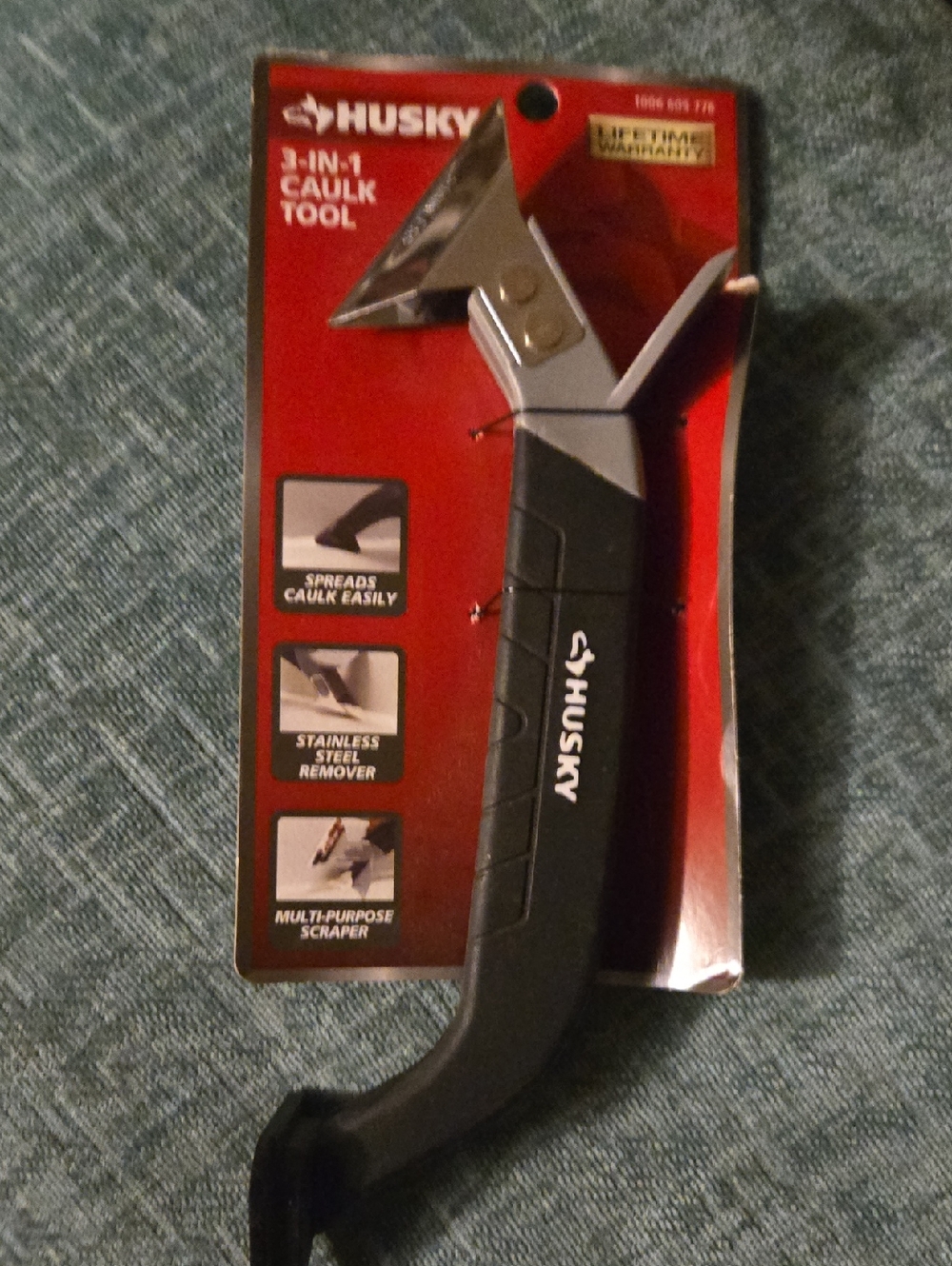 Black 3-in-1 Caulk Tool with Stainless Steel Blade